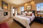 Enjoy the king size bed, flat screen tv and fireplace in the master bedroom